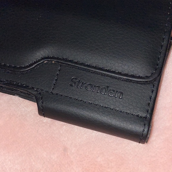 Stronden Black Phone Case. Never used
Fits iPhone 11. 2 pockets inside. - Picture 6 of 9